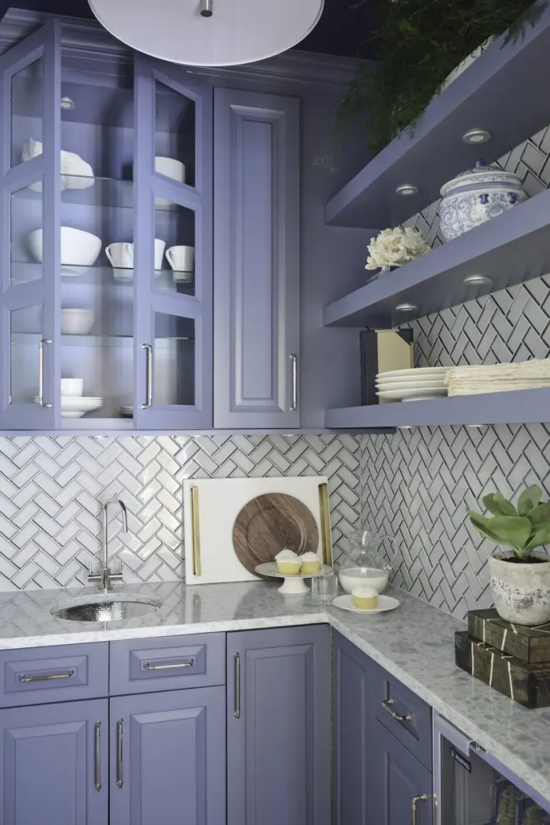 Butler's pantry with monochrome blue cabinetry and floating shelves, designed by Beth Krupa Interiors